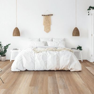luxury vinyl plank flooring in a bright Oregon bedroom